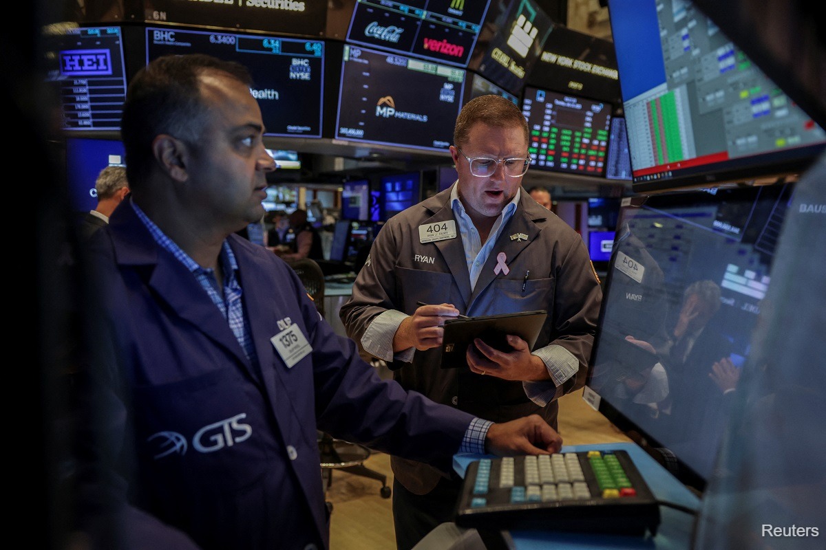 Wall Street slides as hot CPI data fuels rate-hike bets; chips, banks weigh